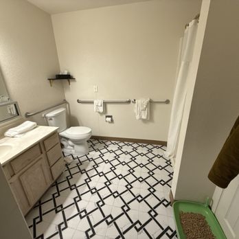 The Enchanted Suites & Residence - Tiled floor bathroom. - Hotels Near Me - Roswell, New Mexico The Enchanted Suites & Residence - Tiled floor bathroom. - Hotels Near Me - Roswell, New Mexico