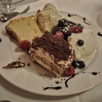 Il Mulino - Desserts sampler. Tiramisu. Flourish chocolate cake. Ricotta Cheesecake - Italian Near Me - New York, New York Il Mulino - Desserts sampler. Tiramisu. Flourish chocolate cake. Ricotta Cheesecake - Italian Near Me - New York, New York