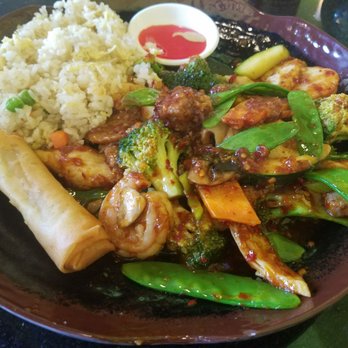Spicy Basil - Happy Family, which is shrimp, chicken, beef & scallops with very fresh mixed veggies in a delicious brown sauce. I asked to make it spicier - Asian Fusion Near Me - Englewood, Colorado Spicy Basil - Happy Family, which is shrimp, chicken, beef & scallops with very fresh mixed veggies in a delicious brown sauce. I asked to make it spicier - Asian Fusion Near Me - Englewood, Colorado