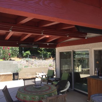 Shamrock Construction - a patio with a table and chairs - General Contractors Near Me - Oxnard, California Shamrock Construction - a patio with a table and chairs - General Contractors Near Me - Oxnard, California