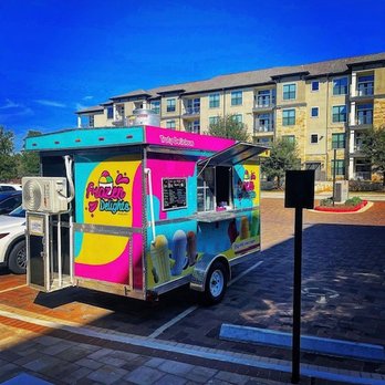 Frozen Delights - a colorful ice cream truck parked in a parking lot - Ice Cream & Frozen Yogurt Near Me - Spring, Texas Frozen Delights - a colorful ice cream truck parked in a parking lot - Ice Cream & Frozen Yogurt Near Me - Spring, Texas