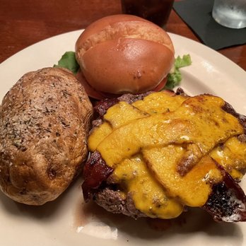 Hereford House - Bacon cheese steak burger with baked potato - Steakhouses Near Me - Independence, Missouri