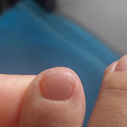 Nails & Lash Boutique - Up close of cut done by technician