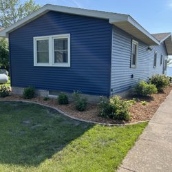 Northern Roots Landscaping - Landscape overhaul. New granite edgers cut and installed with all natural cedar mulch.