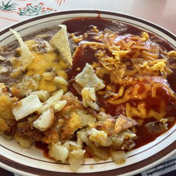 Loyola's Family Restaurant - Huevos rancheros with eggs over medium and red chile - Mexican Near Me - Albuquerque, New Mexico Loyola's Family Restaurant - Huevos rancheros with eggs over medium and red chile - Mexican Near Me - Albuquerque, New Mexico