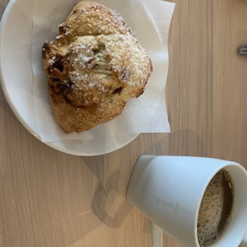 Belle's - Cranberry pecan scone with coffee - Cafes Near Me - Newport, Rhode Island