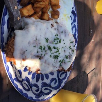 Piggy's Kitchen & Bar - Country Fried Steak (W/ Over Easy Eggs) & a Frozen Mango and Pineapple Mimosa. - Breakfast & Brunch Near Me - Houston, Texas Piggy's Kitchen & Bar - Country Fried Steak (W/ Over Easy Eggs) & a Frozen Mango and Pineapple Mimosa. - Breakfast & Brunch Near Me - Houston, Texas