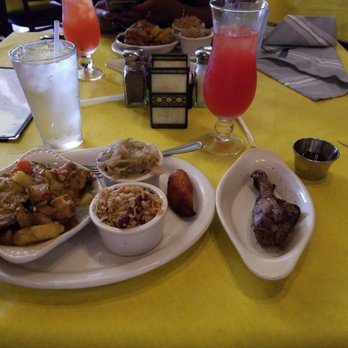 Curry n Jerk - Curry and Jerk Chicken Combo with the Classic Jamaican Rum Punch! - Caribbean Near Me - Memphis, Tennessee Curry n Jerk - Curry and Jerk Chicken Combo with the Classic Jamaican Rum Punch! - Caribbean Near Me - Memphis, Tennessee