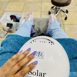 Serenity Nails & Spa - Dip powder on natural nails. She hadn't finished cleaning up around my nail beds.