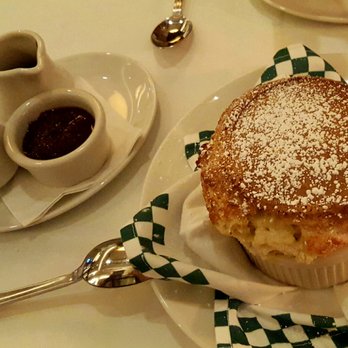 801 Chophouse - grand marnier souffle w/creme anglaise, chocolate sauce, & blueberry compote - Steakhouses Near Me - Denver, Colorado 801 Chophouse - grand marnier souffle w/creme anglaise, chocolate sauce, & blueberry compote - Steakhouses Near Me - Denver, Colorado