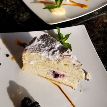 Amber Lantern Restaurant - The Coconut cream Bombe Cake w/ a dollop of mango pudding... yummy!!! And Lemon berry Mascarpone Cake... delicious !!! - Seafood Near Me - Chesapeake, Virginia Amber Lantern Restaurant - The Coconut cream Bombe Cake w/ a dollop of mango pudding... yummy!!! And Lemon berry Mascarpone Cake... delicious !!! - Seafood Near Me - Chesapeake, Virginia