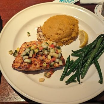 Bahama Breeze - My Tequila Sunburn Glazed Salmon. Notice how small it is. - Bars Near Me - Woodbridge, Virginia