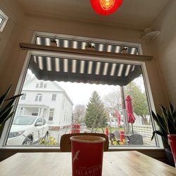 The Islander Cafe - Latte with the window view