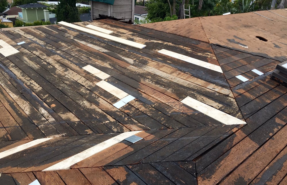 Slide of Gibson's Roofing