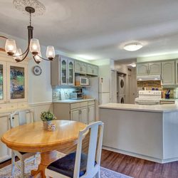 Kim Robbins and Gord Karpinsky - Macdonald Realty - Kitchen, Kim advised painting to lighten and brighten the space...It worked!