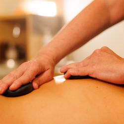 Halo Spa - Massage Therapy with hot stones.