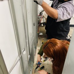 Students learning Commercial wiring