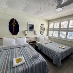 Blue Fish Inn - Lovely bedroom area, comfy immaculate beds and bedding
