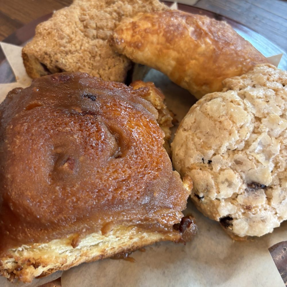 Sticky bun, cherry chocolate scone, blueberry crumble and apply strawberry turnover - everything was delicious!