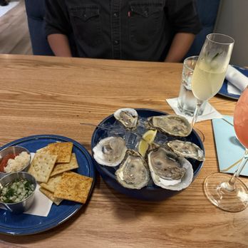 The Finch - The summer special cocktail, a Finch 75 and Oysters. - American Near Me - Nashville, Tennessee The Finch - The summer special cocktail, a Finch 75 and Oysters. - American Near Me - Nashville, Tennessee