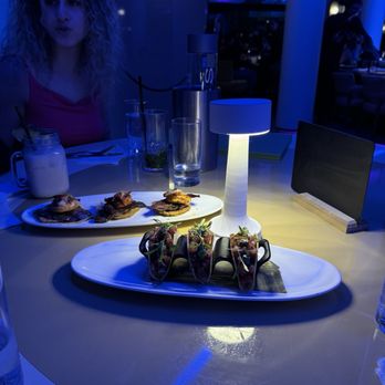 Don Coqui - skirt steak over tostones, tuna tar tar taquitos - Latin American Near Me - Edgewater, New Jersey