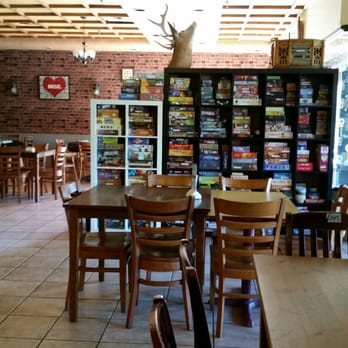 Utopia Dream Cafe - Board game shelf - Coffee & Tea Near Me - Markham, Ontario