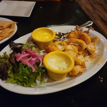Cafe Cusco - Jalea Mixta, crispy calamari shrimp wahoo and trifles with a basil aioli and spicy mayo. - Peruvian Near Me - Springfield, Missouri