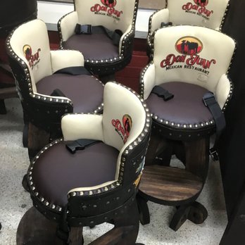 Don Juan - a row of leather bar stools - Mexican Near Me - Austin, Texas