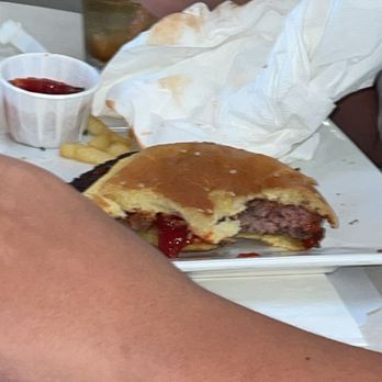 Mel's Drive-In - Here's my son's pink burger - American Near Me - West Hollywood, California Mel's Drive-In - Here's my son's pink burger - American Near Me - West Hollywood, California