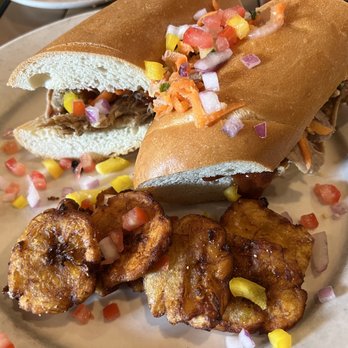 Kuba Kuba - Bar'b'quban Sandwich (roast pork, house bar-b-que sauce & carrot-ginger slaw with
platanos on the side)($10.95). - Cuban Near Me - Richmond, Virginia Kuba Kuba - Bar'b'quban Sandwich (roast pork, house bar-b-que sauce & carrot-ginger slaw with
platanos on the side)($10.95). - Cuban Near Me - Richmond, Virginia