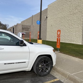 Walmart Supercenter - a white jeep parked in a parking lot - Grocery Near Me - Livonia, Michigan Walmart Supercenter - a white jeep parked in a parking lot - Grocery Near Me - Livonia, Michigan