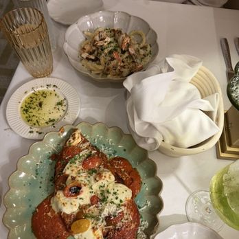 Nonna Mia - Chicken parm, bucatani, and we also got the chopped Italian salad. - Italian Near Me - Fernandina Beach, Florida Nonna Mia - Chicken parm, bucatani, and we also got the chopped Italian salad. - Italian Near Me - Fernandina Beach, Florida