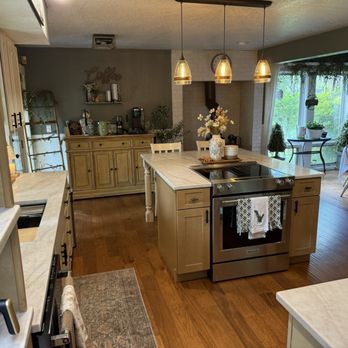 Infinity Stone Works - AFTER: an extended bar with a freestanding stove oven combo with a downdraft. - Countertop Installation Near Me - Lakewood, Washington Infinity Stone Works - AFTER: an extended bar with a freestanding stove oven combo with a downdraft. - Countertop Installation Near Me - Lakewood, Washington