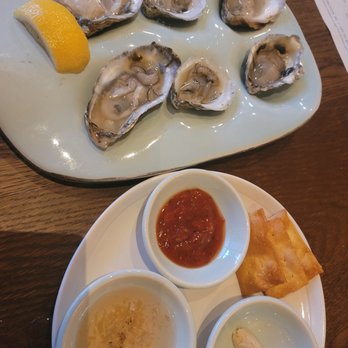 Seabird - Fresh Oysters with Mignonette and Sabal sauce - Seafood Near Me - Wilmington, North Carolina Seabird - Fresh Oysters with Mignonette and Sabal sauce - Seafood Near Me - Wilmington, North Carolina