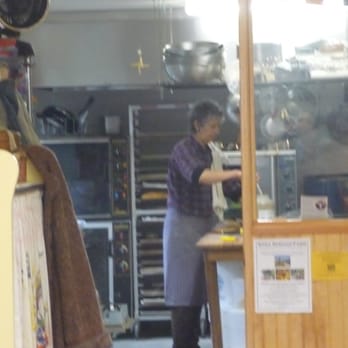 Bread & Roses Bakery - the magician at her work - Bakeries Near Me - Yachats, Oregon Bread & Roses Bakery - the magician at her work - Bakeries Near Me - Yachats, Oregon