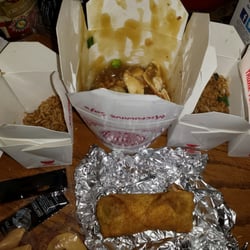 Yat Son Restaurant - What's left of my son's favorite carryout meal. Almond chicken, egg rolls and fried rice.