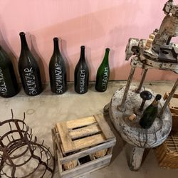 SAS Champagne Michel Fagot - Bottle sizes and a corking machine of old.