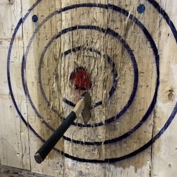 Up close of the only decent throw I made. They wet down the panels to help the axes stick.