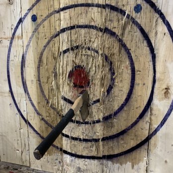 Bad Axe Throwing Atlanta - Up close of the only decent throw I made. They wet down the panels to help the axes stick. - Axe Throwing Near Me - Atlanta, Georgia