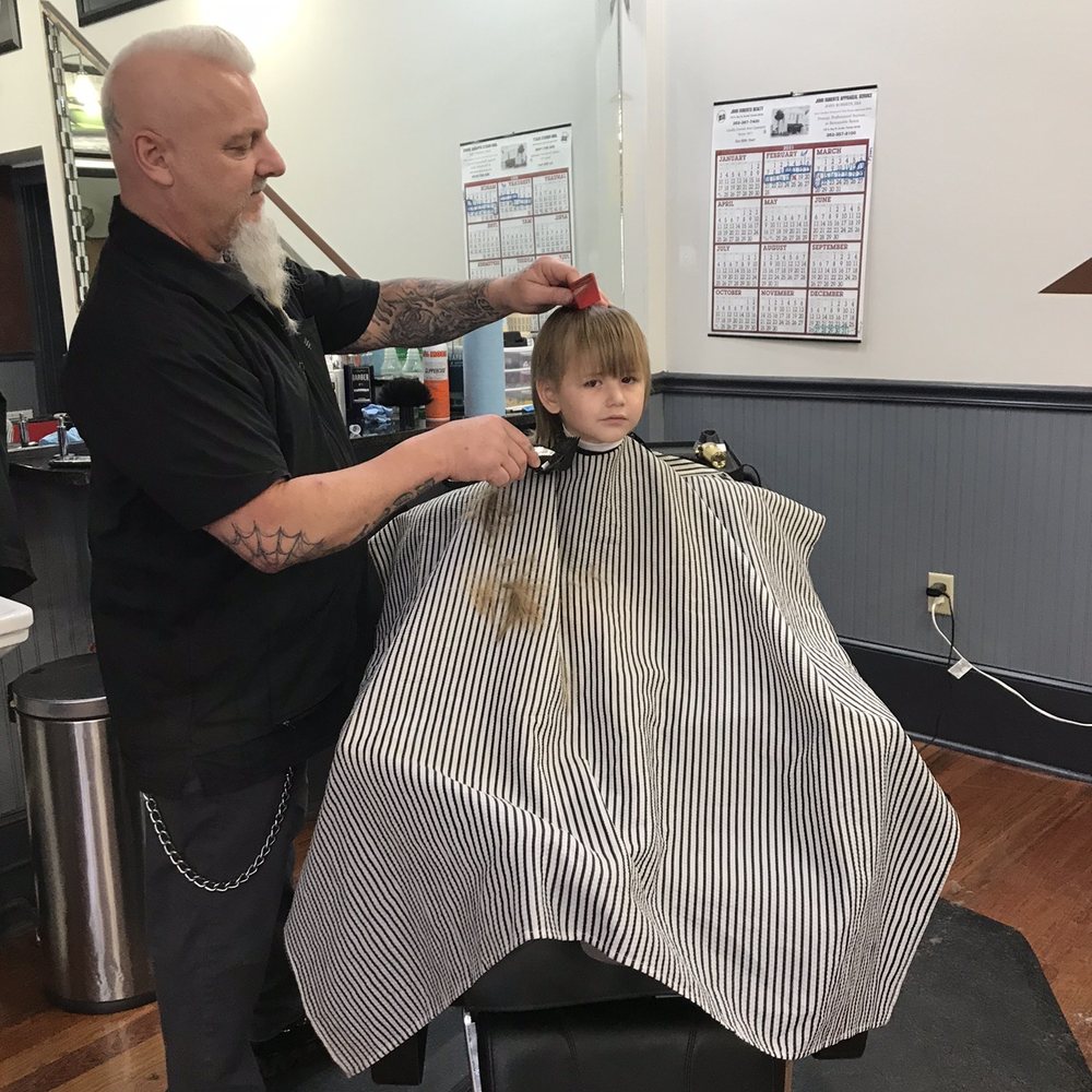 Lake Eustis Barber Shop - Mr. Tim was patient and did a great job on this little moving target! - Barbers Near Me - Eustis, Florida