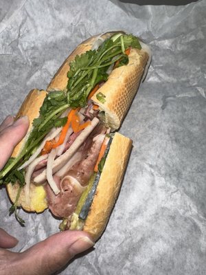 Avian Water and Banh Mi Sandwich by null