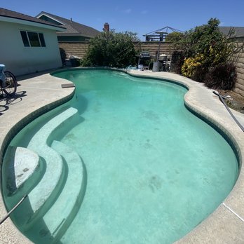 Beachfront Pool Service - After Paul worked his magic   ***plaster is 40+ years old ignore the black - Pool Cleaners Near Me