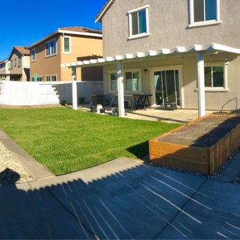 Rusbelt Landscape - a view of the back yard of a home - Landscaping Near Me - Galt, California
