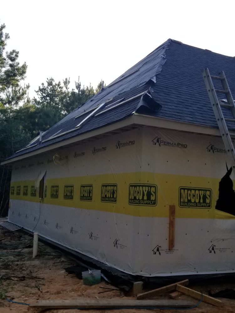 Slide of Red Bull Roofing Solutions