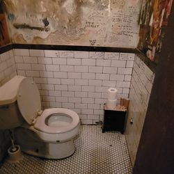 Harvard & Stone - Women's bathroom. Trying to be "dive"?