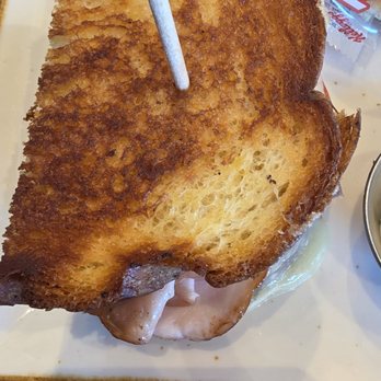 First Watch - Lovely half sandwich, loaded with smoked turkey and provolone cheese, grilled to perfection. - Breakfast & Brunch Near Me - Blue Springs, Missouri