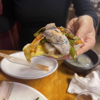 Jagalchi - Koreans often use lettuce or cabbage as a taco. Don't forget the raw garlic and the fermented bean paste! - Korean Near Me - Honolulu, Hawaii Jagalchi - Koreans often use lettuce or cabbage as a taco. Don't forget the raw garlic and the fermented bean paste! - Korean Near Me - Honolulu, Hawaii