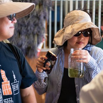 Hambly Lavender Farm - Visitors learning about Lavender Essential Oil Distillation, Drying and farming. - Farms Near Me - San Miguel, California Hambly Lavender Farm - Visitors learning about Lavender Essential Oil Distillation, Drying and farming. - Farms Near Me - San Miguel, California