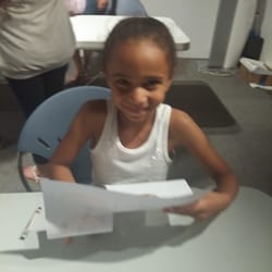Midland County Public Libraries - Centennial Library - Nana cutting out Dinosaurs