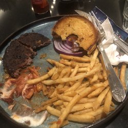 RC Grille - The remains of one nasty Marriott Burger. Medium Rare and it's a brick.